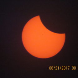 The eclipse begins in Salem, OR. Credit: Victoria Strand